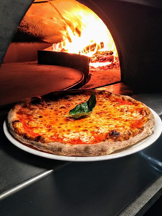 500-Pizza-en-oven-1623065850-1681903912.jpg